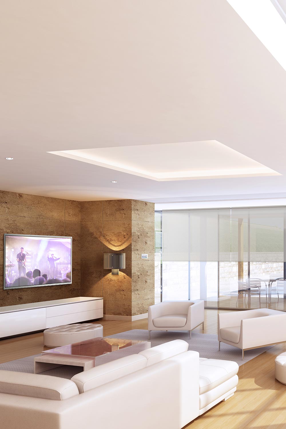 Modern bright living room with white sofas, a large wall-mounted television, and automated shades